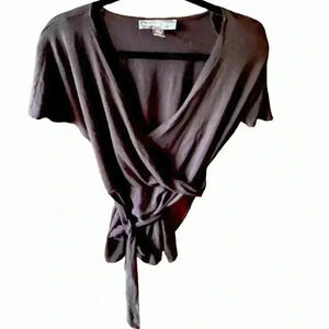 Josephine Chaus XL black surplice short sleeve wrap top. Attached belt . VGUC.